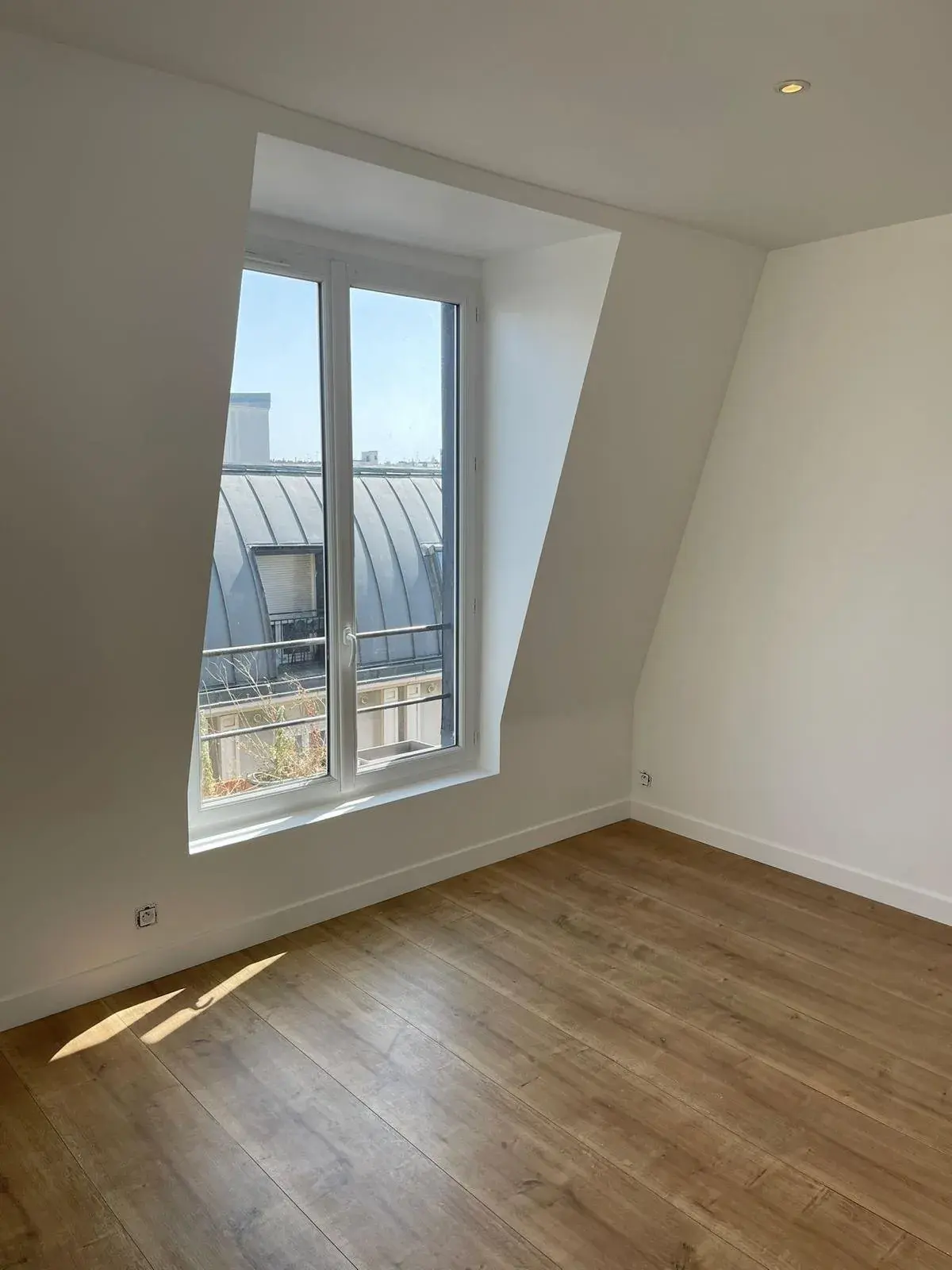 Rénovation d'un appartement sous les toits d'inspiration parisienne